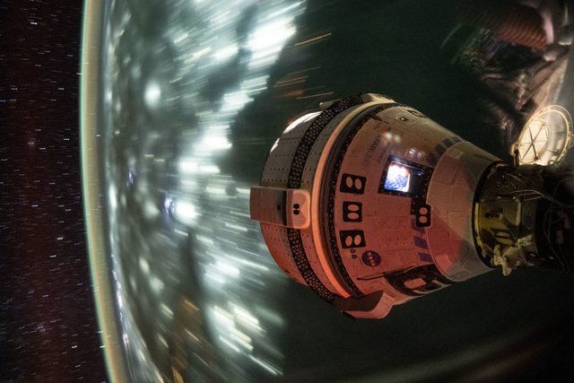 Boeing's Starliner spacecraft that launched NASA's Crew Flight Test astronauts Butch Wilmore and Suni Williams to the International Space Station is pictured docked to the Harmony module's forward port. This long-duration photograph was taken on July 3, 2024, from the orbital complex as it soared 25