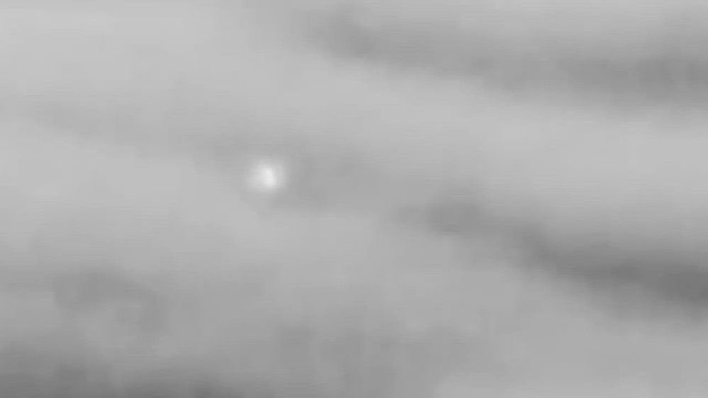 Still frame from the video DOW-UAP-PR054, "Spherical UAP Erratic movement [CALLSIGN] (Mission) 2022"