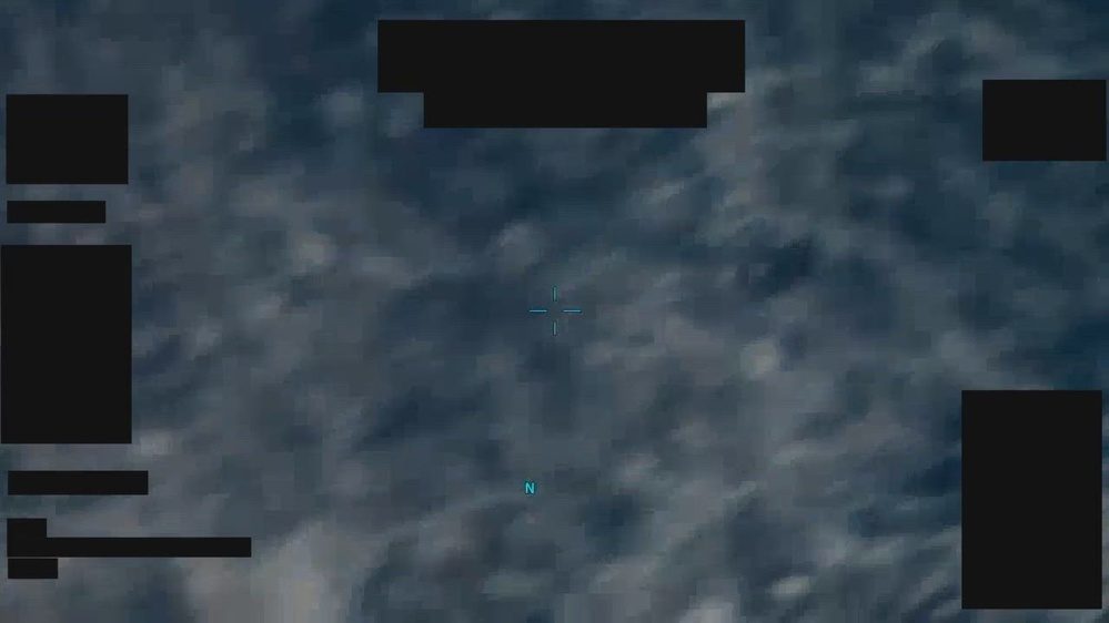 Still frame from the video DOW-UAP-PR062, "Spherical UAP [CALLSIGN] 2021/04/12 vid 1"