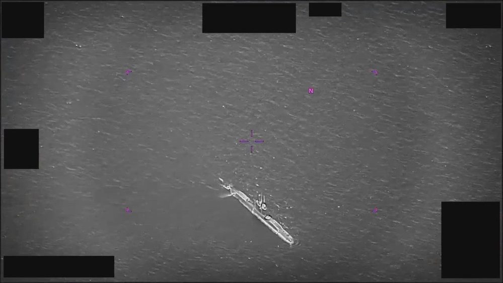 Still frame from the video DOW-UAP-PR067, "Multiple Spherical UAP USO near Sub. [CALLSIGN] 2022/03/25 in and out of water"