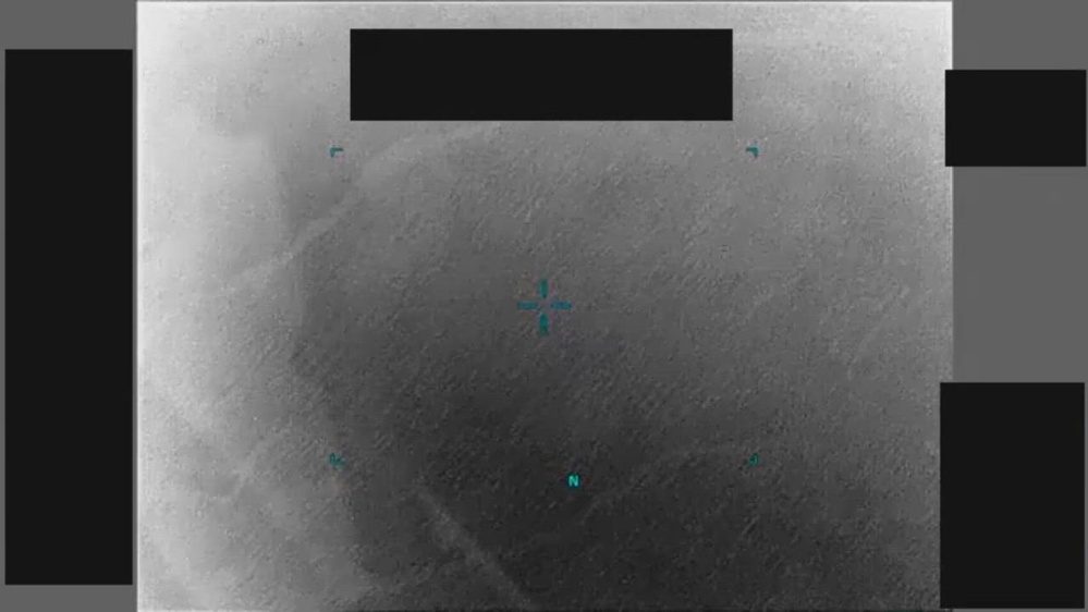 Still frame from the video DOW-UAP-PR097, "Hi-Res: [CALLSIGN] Observes UAP on 25SEP19 at 2135Z"